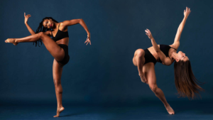 Two dancers strike dynamic poses seemlngly beyond the obstructions of gravity.